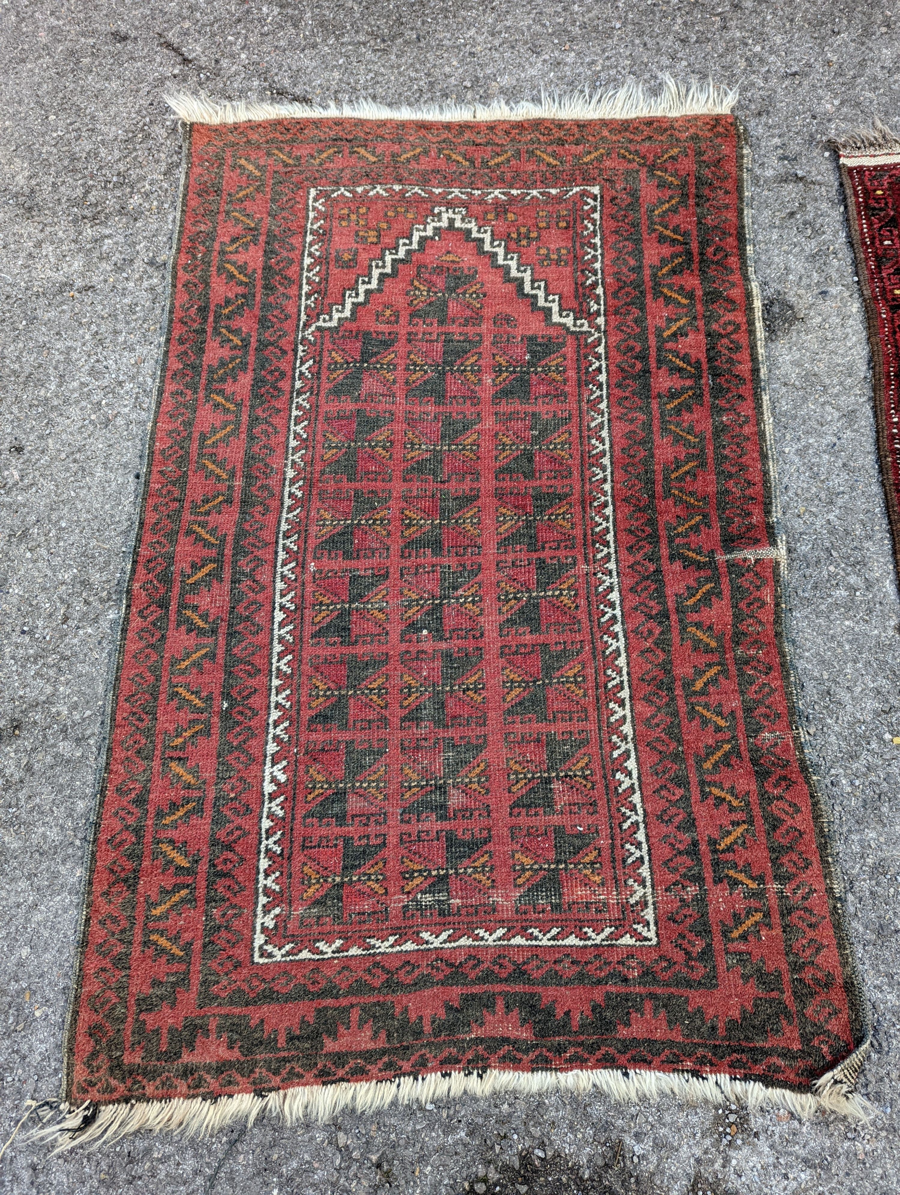 Three Bokhara rugs, largest 134 x 84cm
